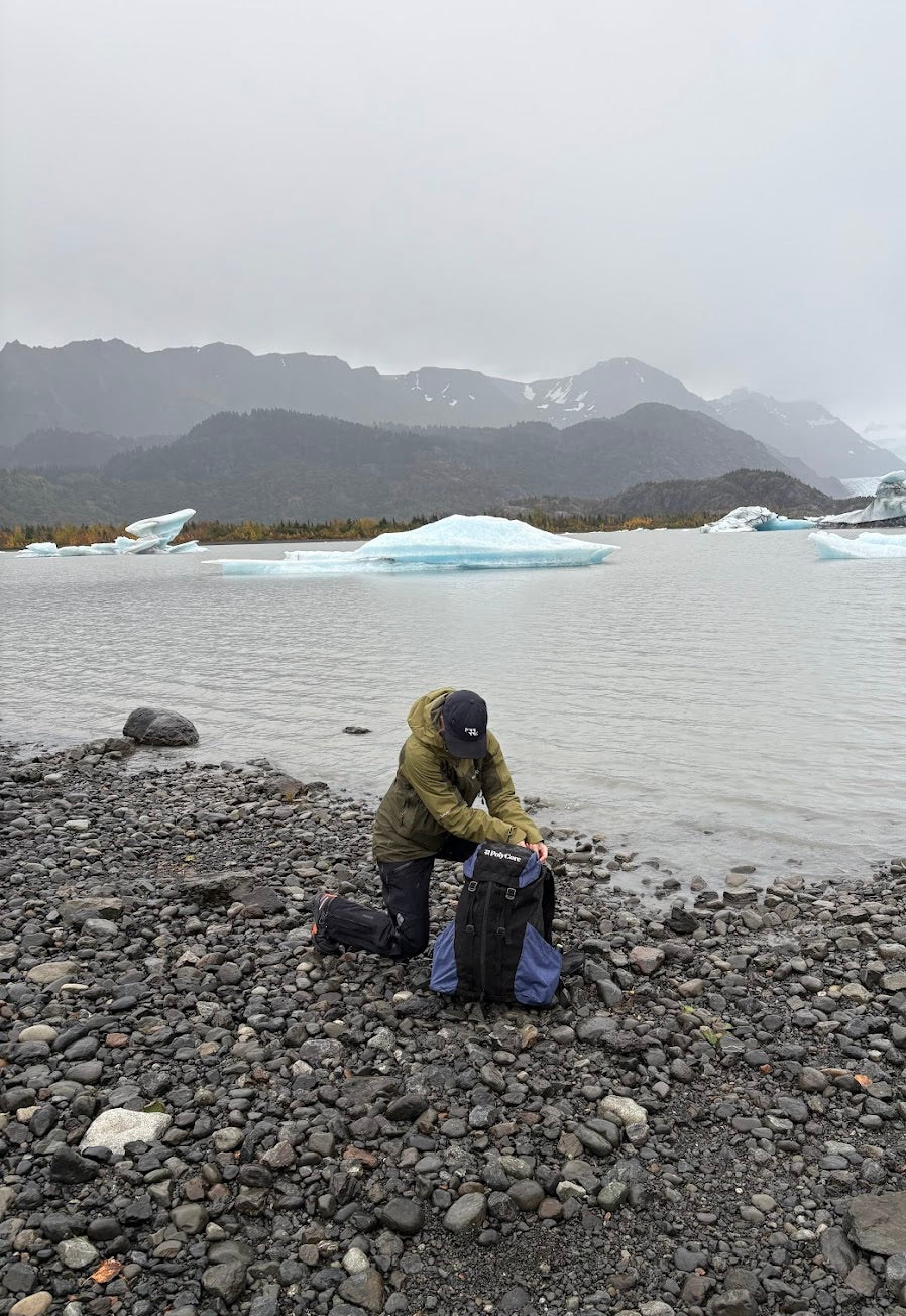 In the rainy backcountry of the Kenai Peninsula, testing a backpack made with ReCirX²-coated fabric. 